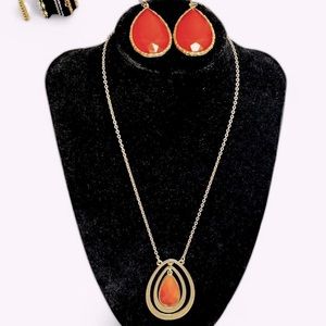 Gold and tangerine statement necklace and earrings set.